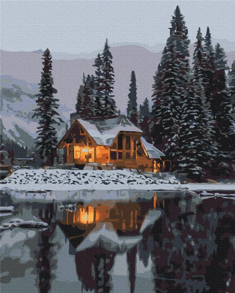 Quadro fai da te - Snow-covered cottage in the mountains