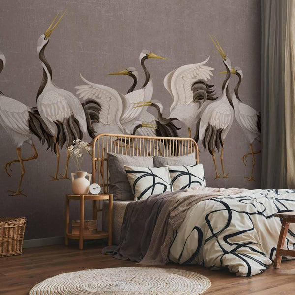 Carta da parati - Crane dance – bright silhouettes of birds against a warm grey background with texture