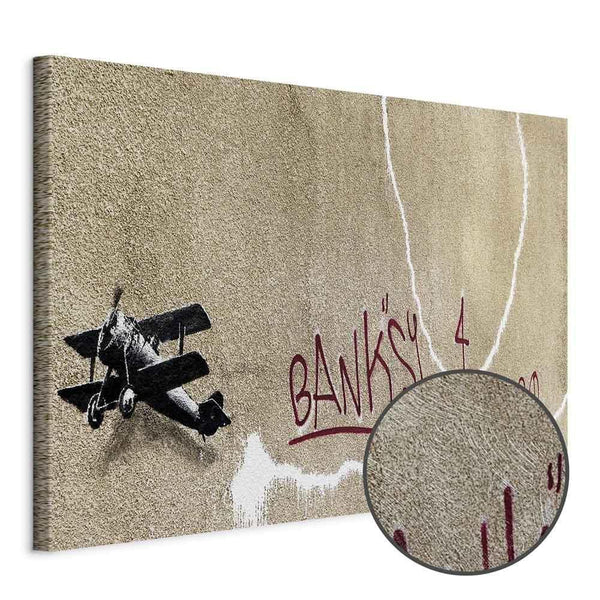 Quadro - Banksy's Plane (1-part) - Red Graffiti Text on Mural Background