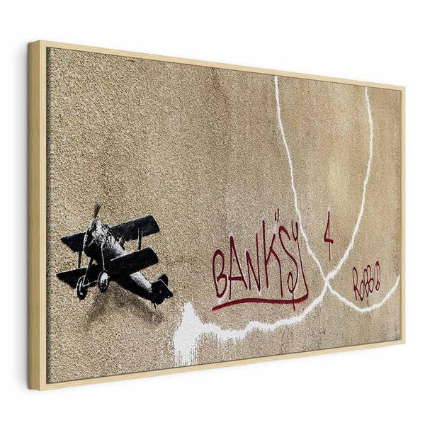 Quadro - Banksy's Plane (1-part) - Red Graffiti Text on Mural Background