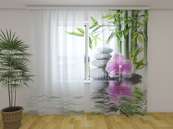 Foto Tende Orchidea Rosa Con Bambù e Pietre